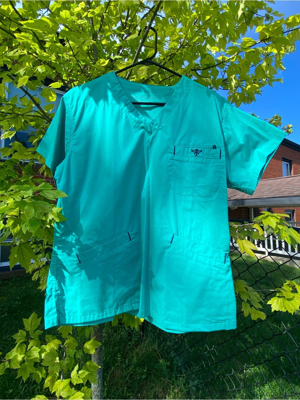 Med Couture medical scrub top. SZ M. Teal/navy. Style: 8403